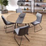 Кръгла разтегателна маса с метална основа   столове отгоре