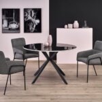 Кръгла маса с метални крака и плот в черно и бяло   интериорна