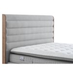 Сиво тапицирано легло с място за съхранение детайли, табла